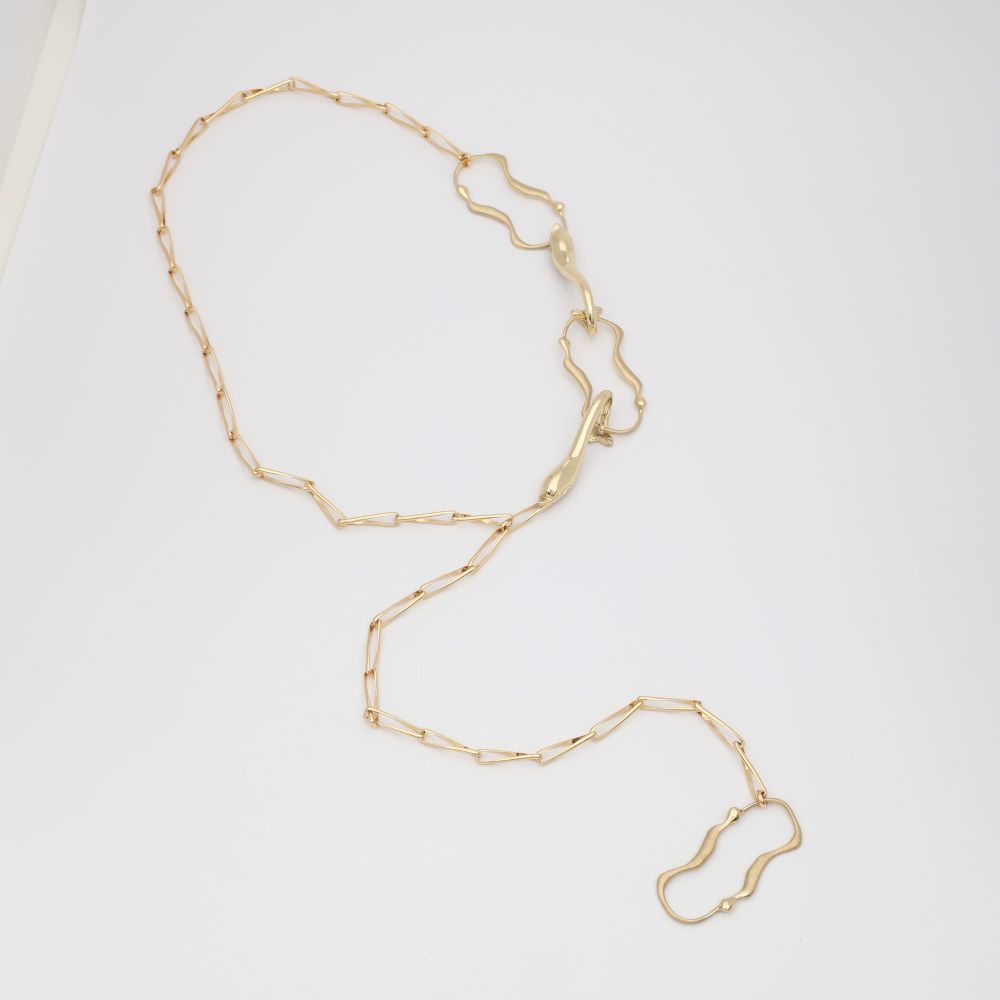 Gold chain necklace on a white background