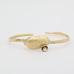 handmade brass statement cuff with organic shell motif, artisan jewelry made in Greece