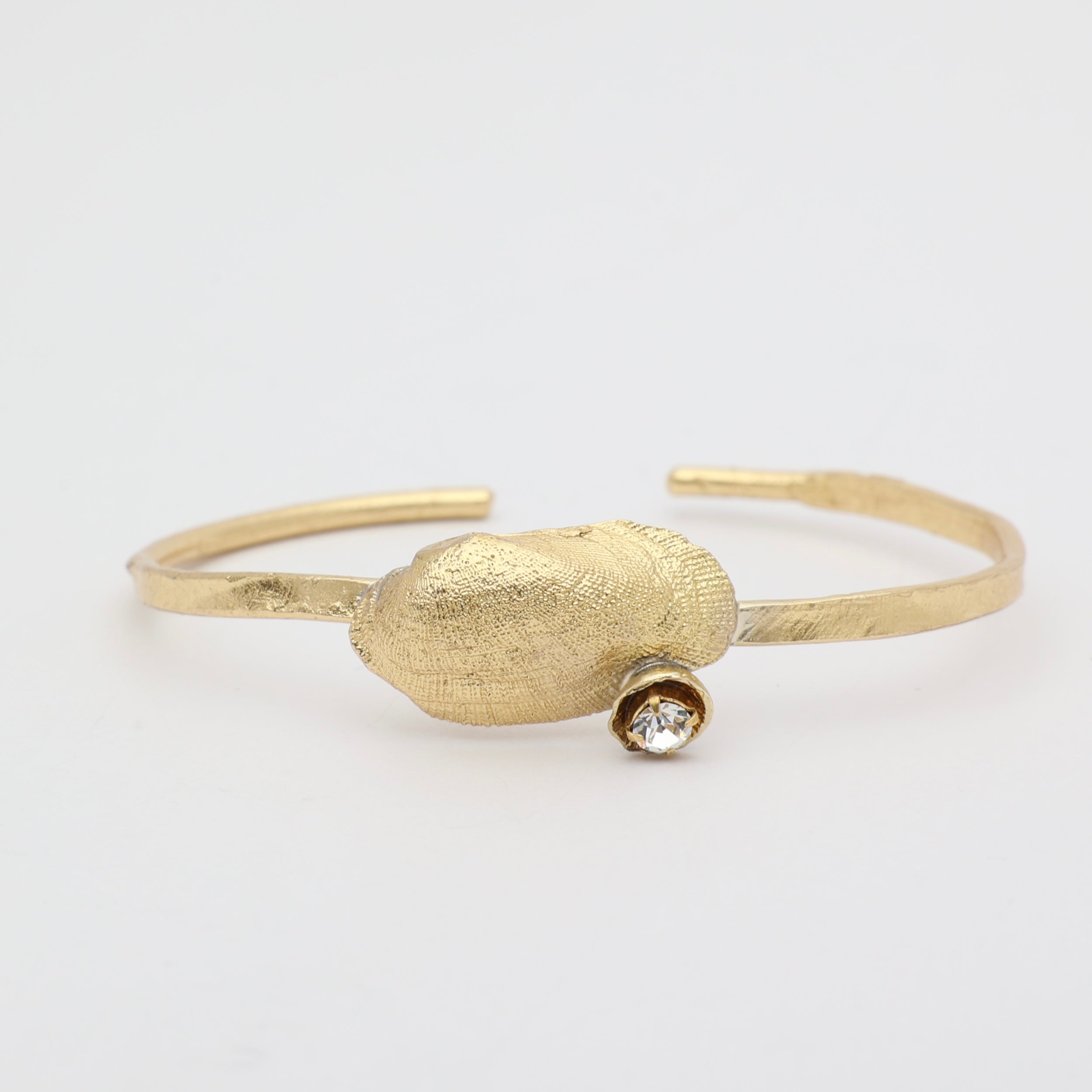 handmade brass statement cuff with organic shell motif, artisan jewelry made in Greece