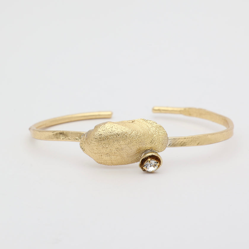 handmade brass statement cuff with organic shell motif, artisan jewelry made in Greece