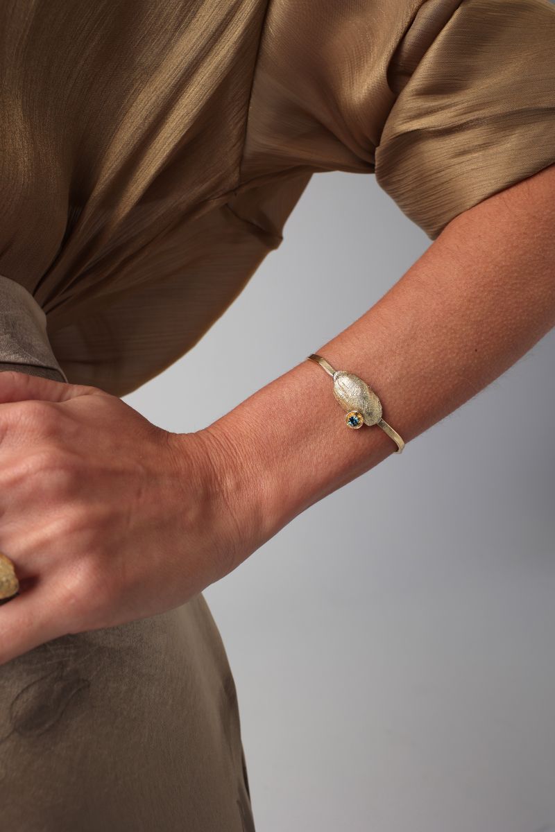 Limpet Bracelet detail — handmade brass statement cuff with organic shell motif, artisan jewelry made in Greece