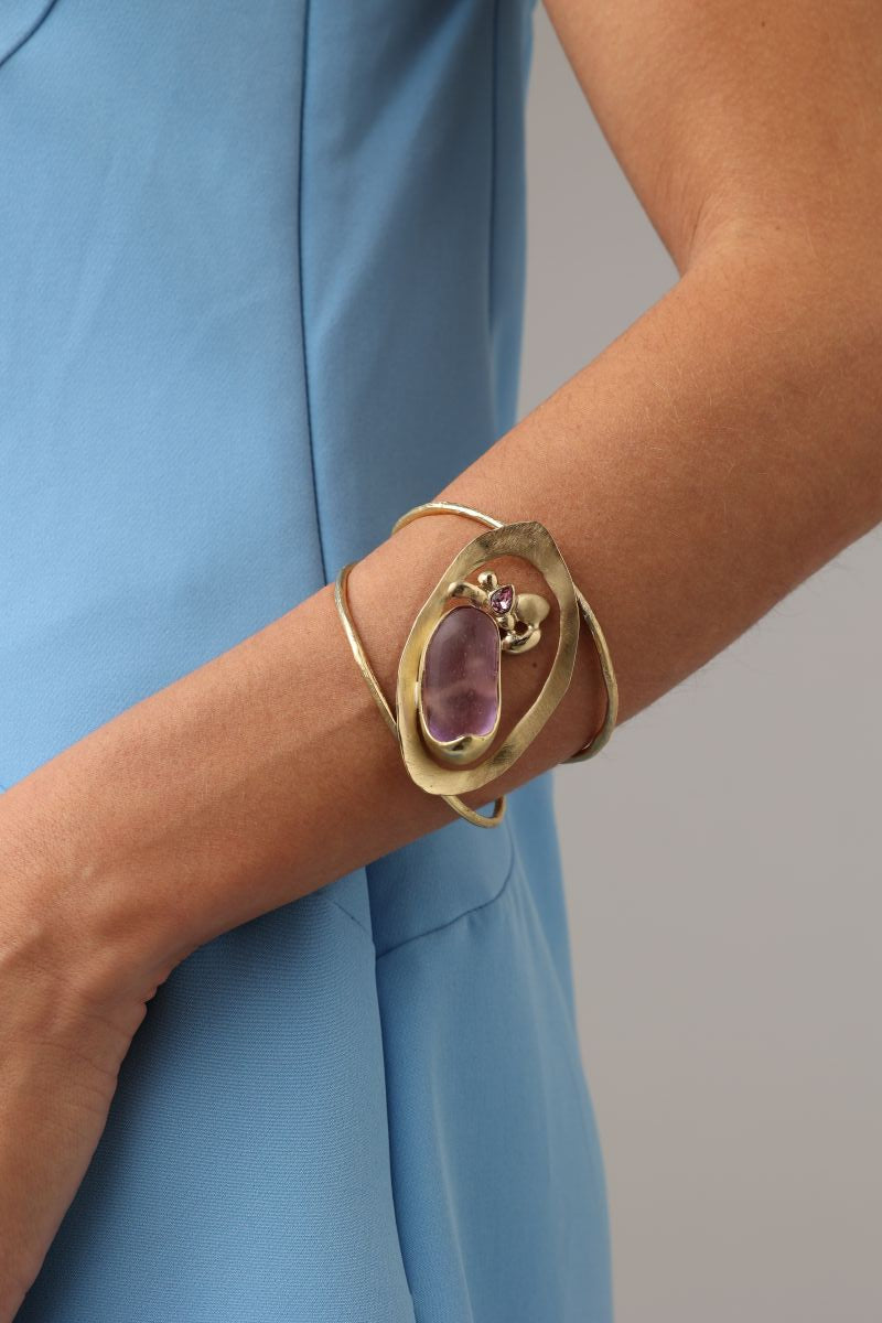 Pulse Bracelet on model — handmade brass oval frame cuff bracelet with resin stone and crystal worn on wrist
