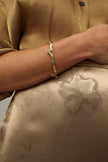 Handmade brass artisan bracelet with sculptural leaf design and crystal, artisan jewelry made in Greece