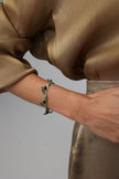 Handmade brass artisan bracelet with sculptural botanical design, artisan jewelry made in Greece