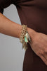 Handmade brass bold statement bracelet with sculptural leaf drops, artisan jewelry made in Greece