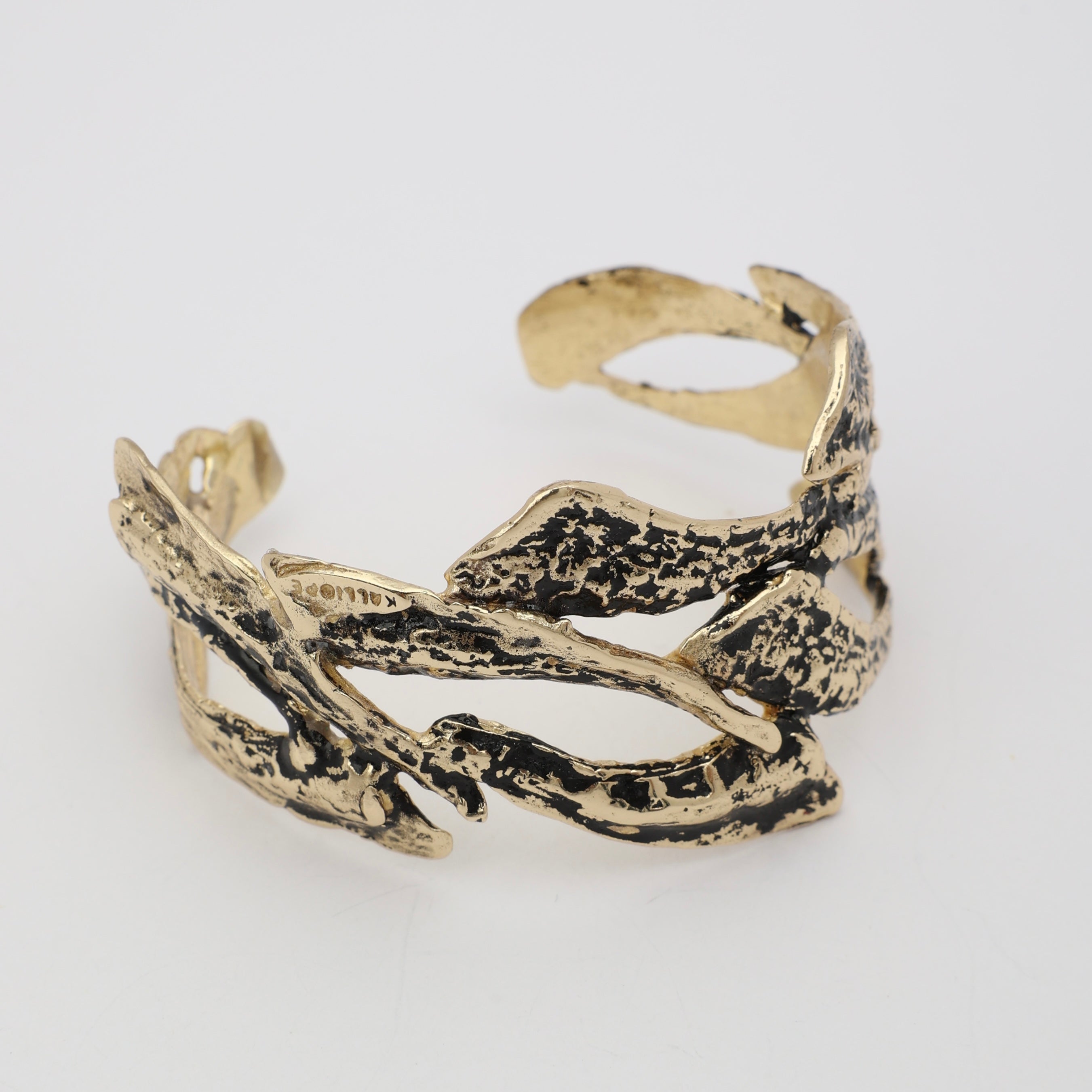 Nerra Bracelet — handmade brass wide open cuff with sculptural coral branch structure on white background
