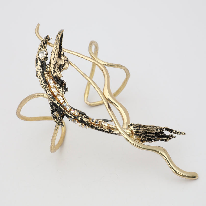 Dragonfish Bracelet — handmade brass  cuff with crystal accents on white background
