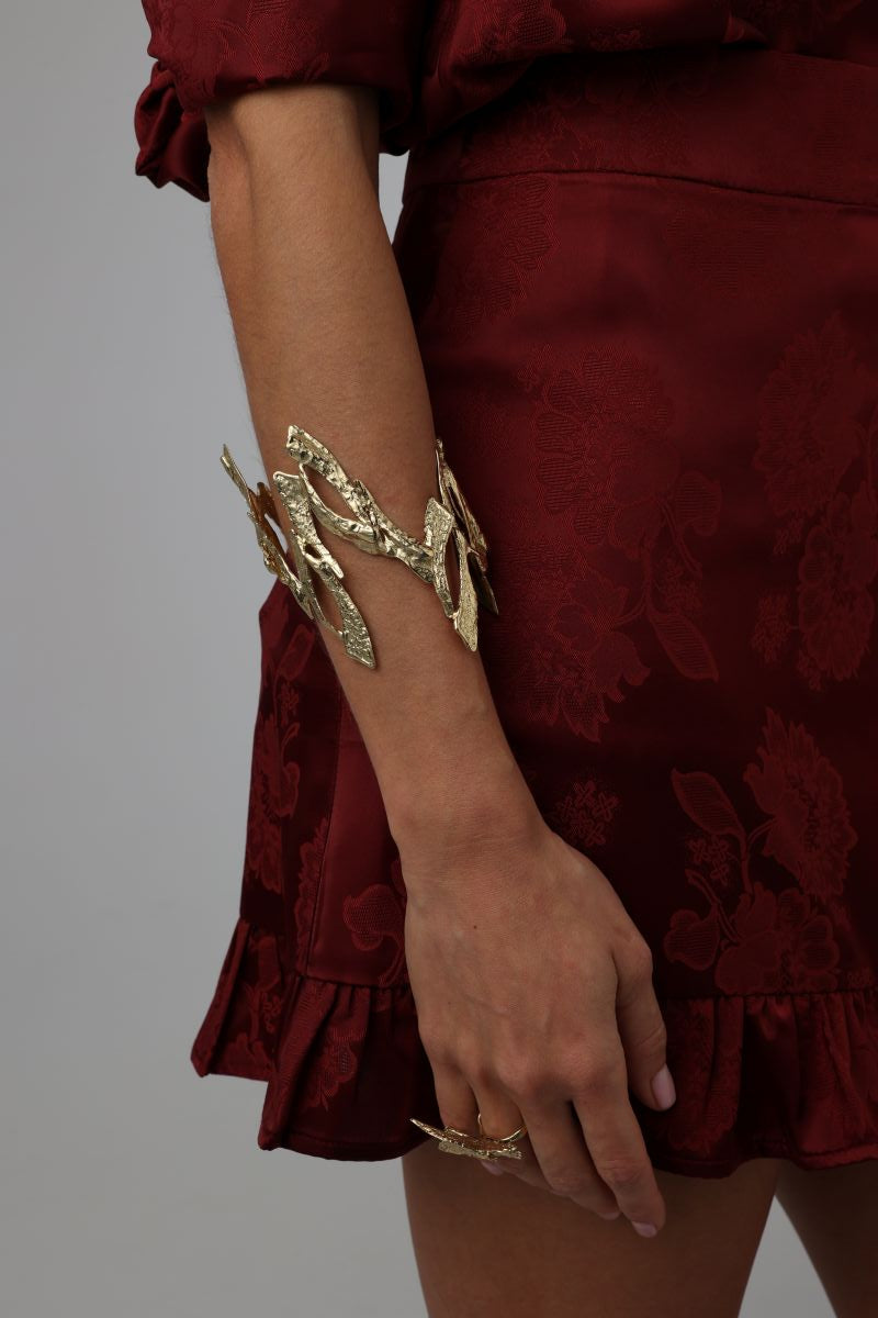 Double Nera Bracelet on model — handmade brass wide double cuff bracelet stacked above the wrist