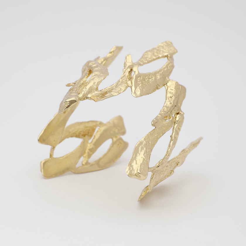 Double Nera Bracelet — handmade brass double cuff with sculptural coral branch structure on white background
