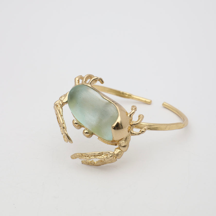Crabby Bracelet — handmade brass statement cuff bracelet with crab and resin stone centerpiece
