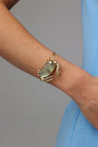 Crabby Bracelet detail — handmade brass crab motif bracelet with resin stone, sculptural artisan jewelry