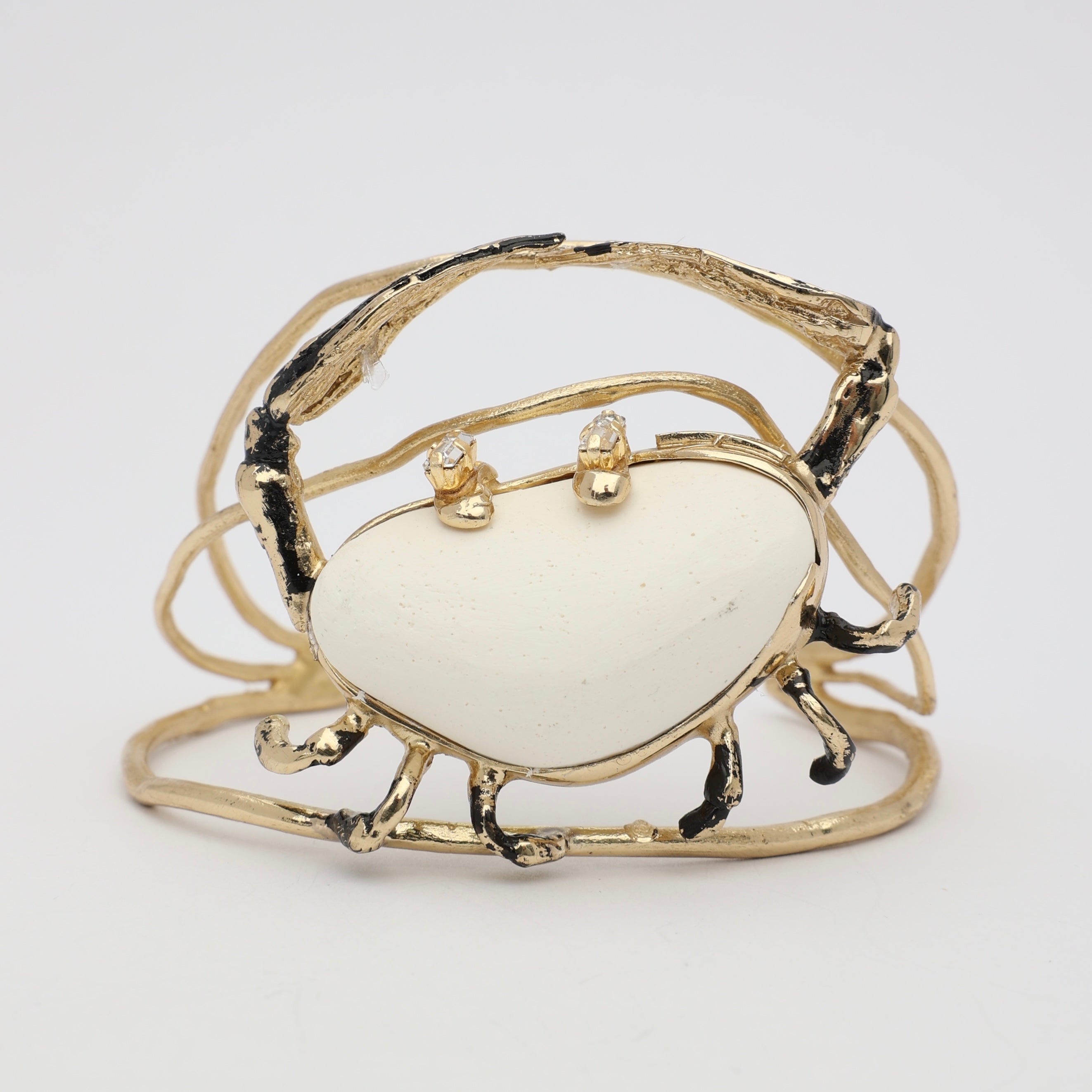 Claw Crabby Bracelet — handmade brass open cuff with crab leg motif, resin stone and crystals