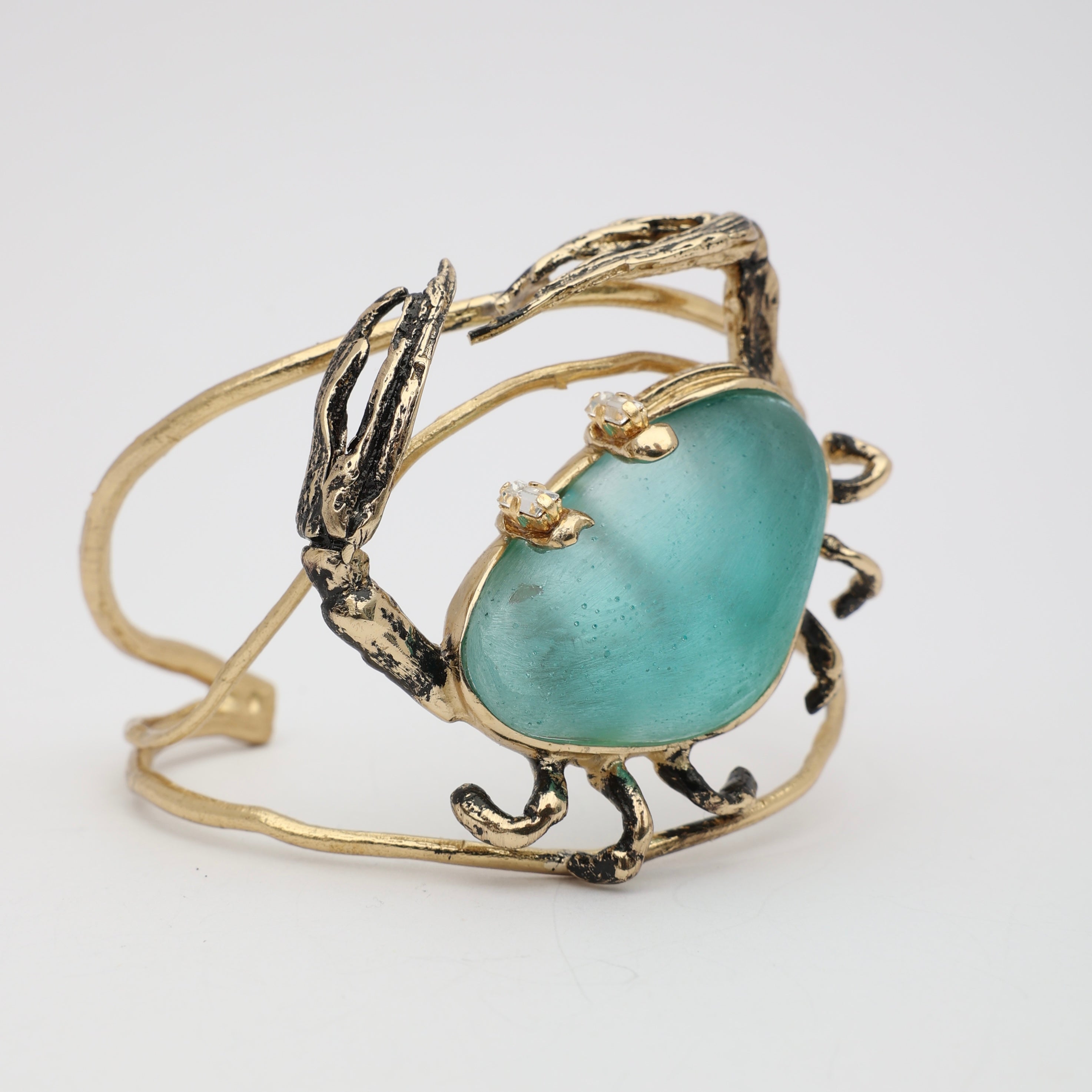 Claw Crabby Bracelet — handmade brass sculptural jewelry with sea-inspired crab form and resin stone