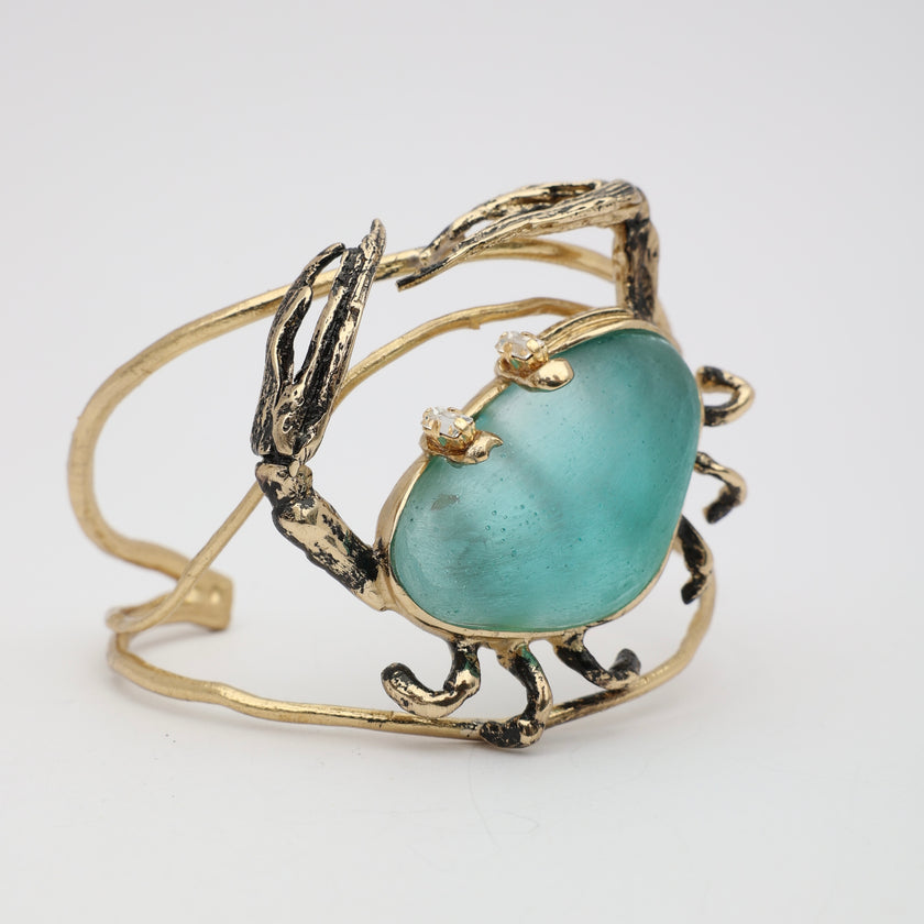 Claw Crabby Bracelet — handmade brass sculptural jewelry with sea-inspired crab form and resin stone