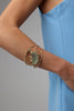 Claw Crabby Bracelet — handmade brass open crab claw cuff with pale resin stone centerpiece
