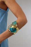 Crabby The Thief Bracelet — handmade brass hammered cuff with two teal resin stones and crab sculpture