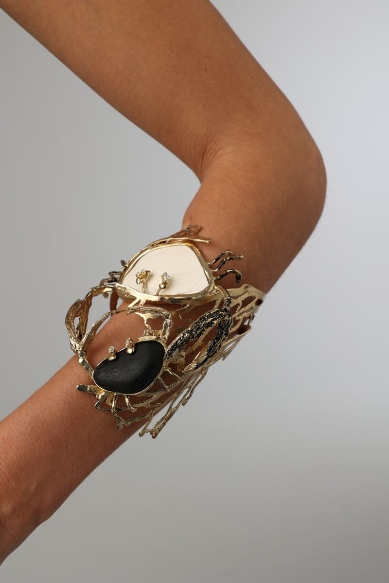 Crabby The Dancers Bracelet — handmade brass statement cuff bracelet with black and white resin stones and crab sculpture