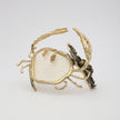 Crasta Bracelet angle view — handmade brass sculptural sea creature cuff with organic stone and mixed texture detail