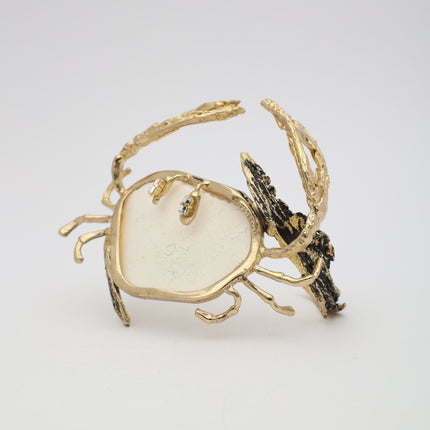 Crasta Bracelet angle view — handmade brass sculptural sea creature cuff with organic stone and mixed texture detail