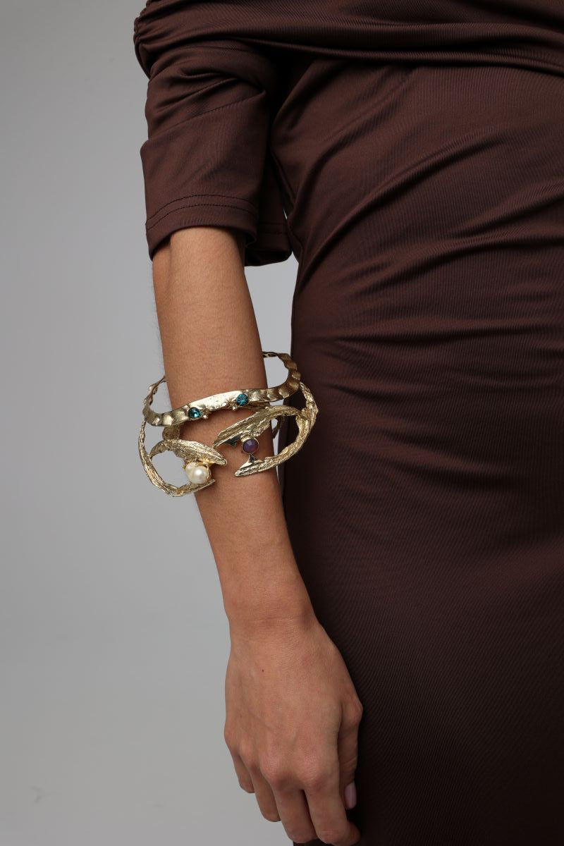 King Astor Bracelet — handmade brass artisan cuff bracelet with teal and purple crystals and pearl centerpiece