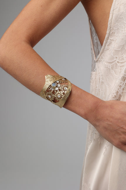 Textured molten style handmade gold bracelet for women, adjustable sculptural jewelry designed in Athens