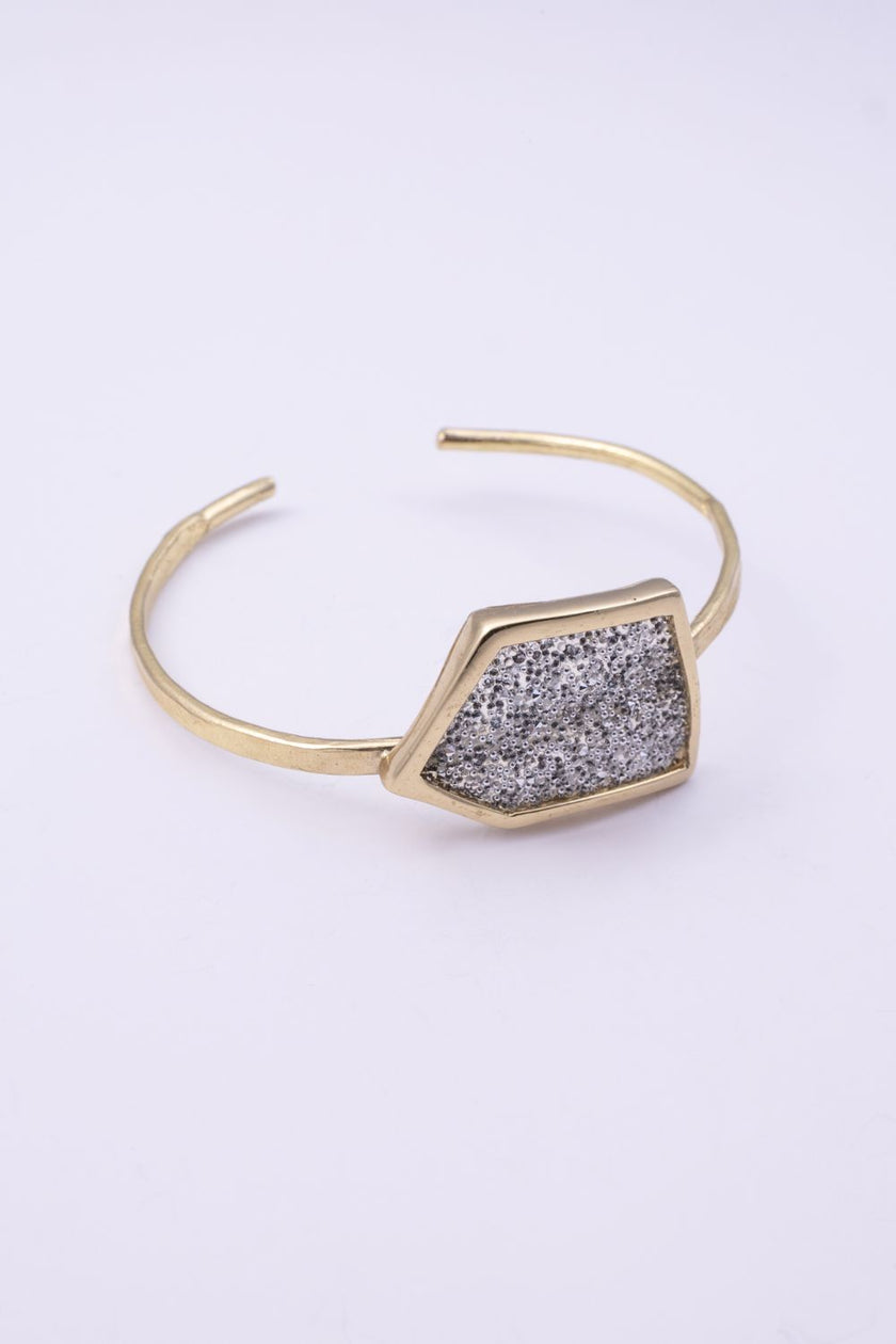 Sparkle cuff bracelet with crystal panel and sculptural gold frame