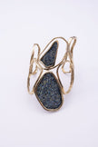 Wide sculptural gold cuff bracelet with two compressed crystal surfaces, Glitter Kiss
