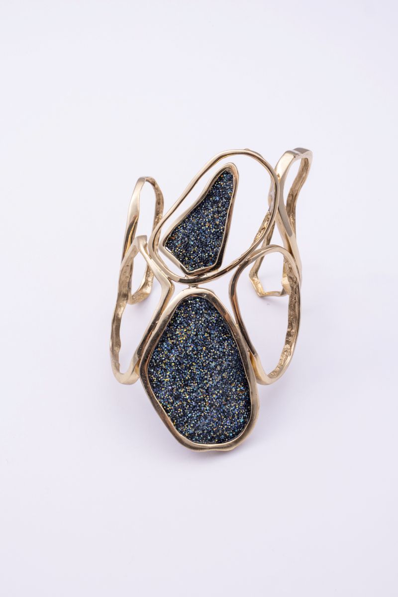 Wide sculptural gold cuff bracelet with two compressed crystal surfaces, Glitter Kiss