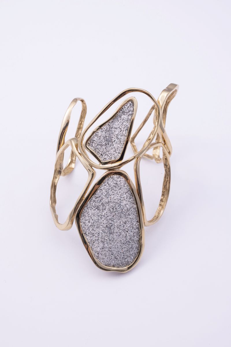 Shimmer cuff bracelet with open gold loops and crystal panels
