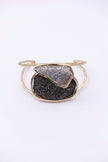 Front view of open double-band gold cuff bracelet with layered crystal panels, handmade in Greece