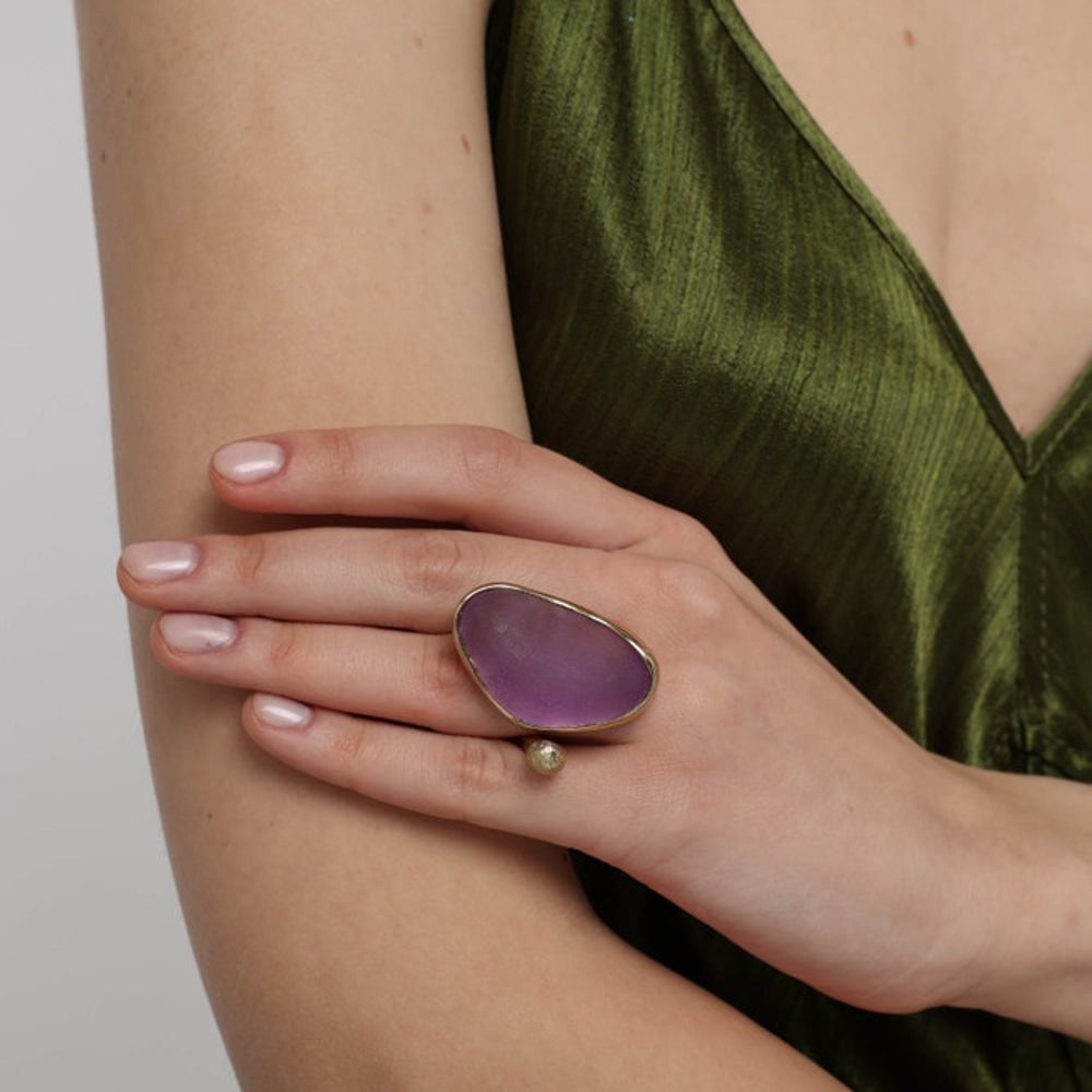 Elemental Pebble Ring front view — handmade brass ring with elongated organic pebble shaped stone