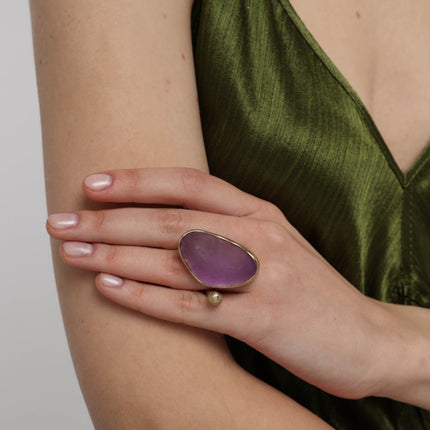 Elemental Pebble Ring front view — handmade brass ring with elongated organic pebble shaped stone