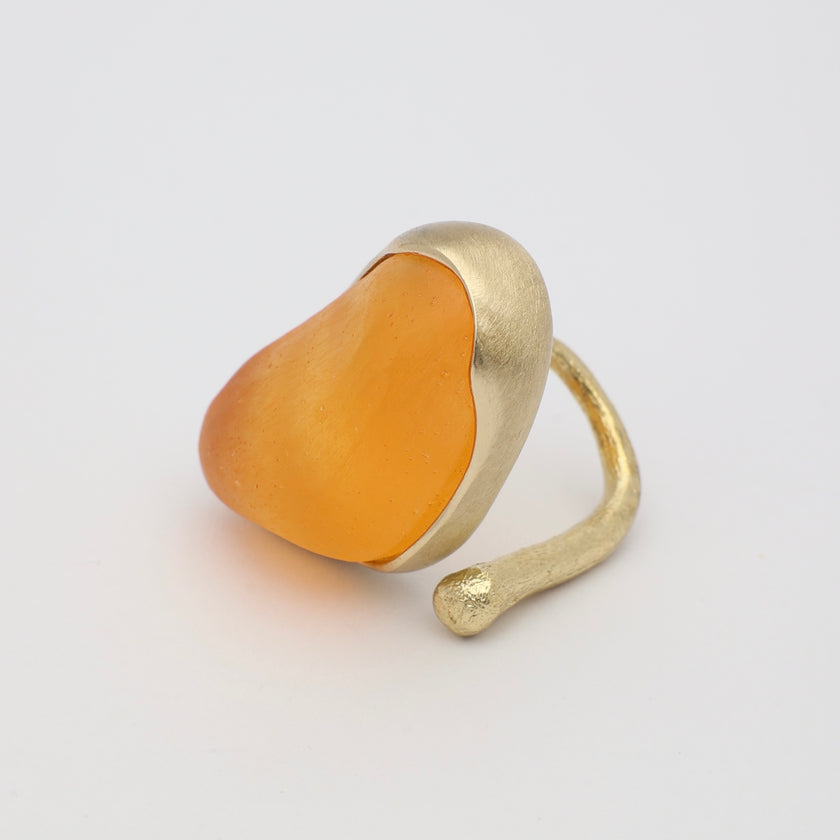 Elemental Pebble Ring — handmade brass statement ring with large resin stone on white background
