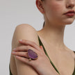 Elemental Pebble Ring — handmade brass statement ring with large resin stone on model