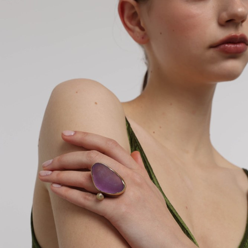 Elemental Pebble Ring — handmade brass statement ring with large resin stone on model