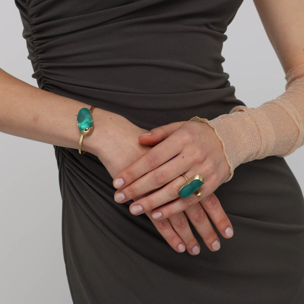 Earthpulse Ring — handmade brass statement ring with oval resin stone on model
