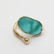 Earthpulse Ring — handmade brass statement ring with oval resin stone on white background
