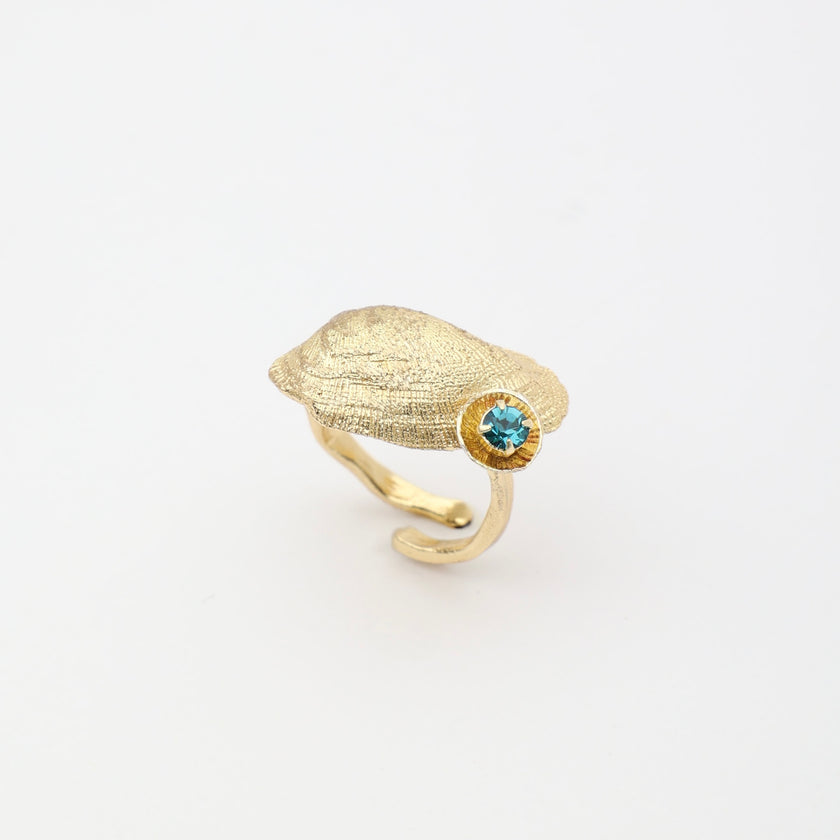 Limpet Ring angle view — handmade brass adjustable ring with organic shell-inspired design
