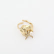 Tide Ring — handmade brass adjustable ring with sculptural shell and pearl on white background
