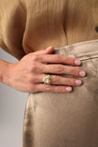 Tide Ring on model — handmade brass statement ring worn on finger