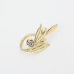 handmade brass nature-inspired statement ring with sculptural leaf and fruit design