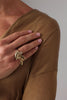 handmade brass sculptural statement ring with leaf motifs and crystal