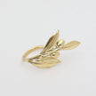 Handmade brass nature-inspired statement ring with sculpted leaf and berry details, artisan jewelry made in Greece