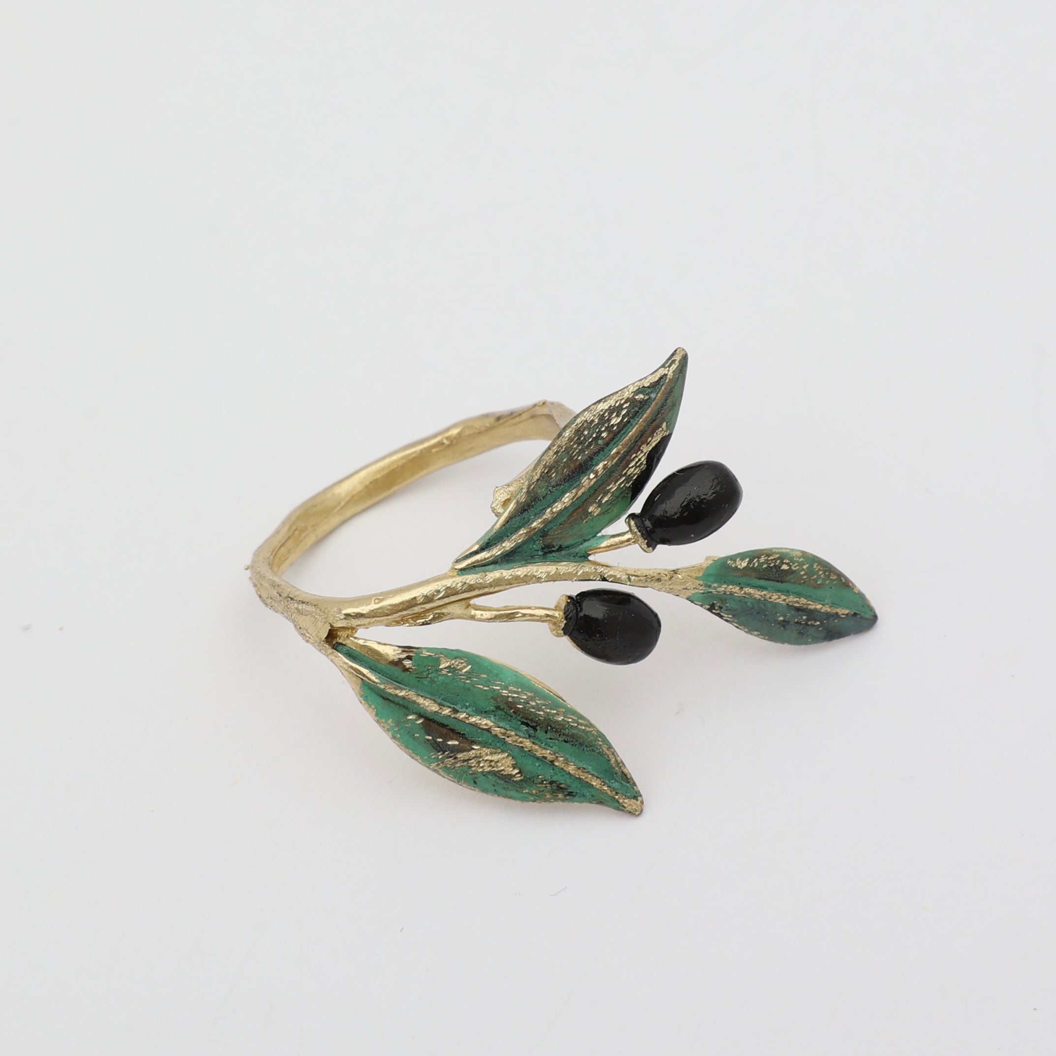 Handmade brass nature-inspired ring with olive leafs and fruit details, artisan jewelry made in Athens, Greece