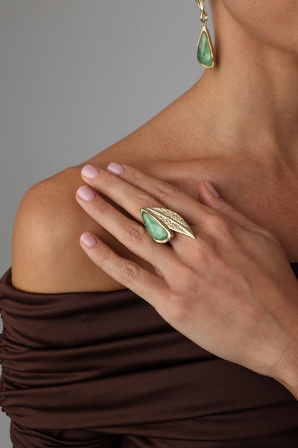 Handmade brass sculptural statement ring with resin stone and pointed leaf design

