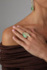 Handmade brass sculptural statement ring with resin stone and pointed leaf design
