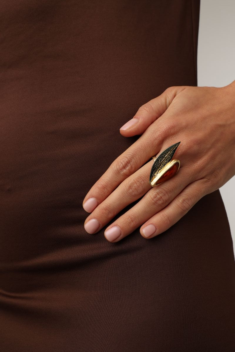 Handmade brass artisan cocktail ring with raw stone and sculptural brass leaves, artisan jewelry made in Greece