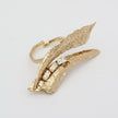 Sparkly Nerra Ring — handmade brass adjustable ring with textured blade design and crystal accents on white background