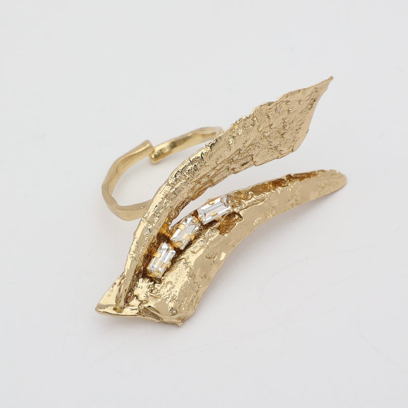 Sparkly Nerra Ring — handmade brass adjustable ring with textured blade design and crystal accents on white background