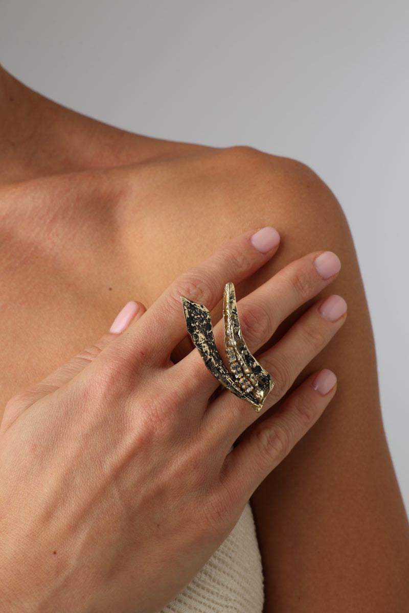 Sparkly Nerra Ring close-up — handmade brass statement ring with organic blade motif and baguette crystals